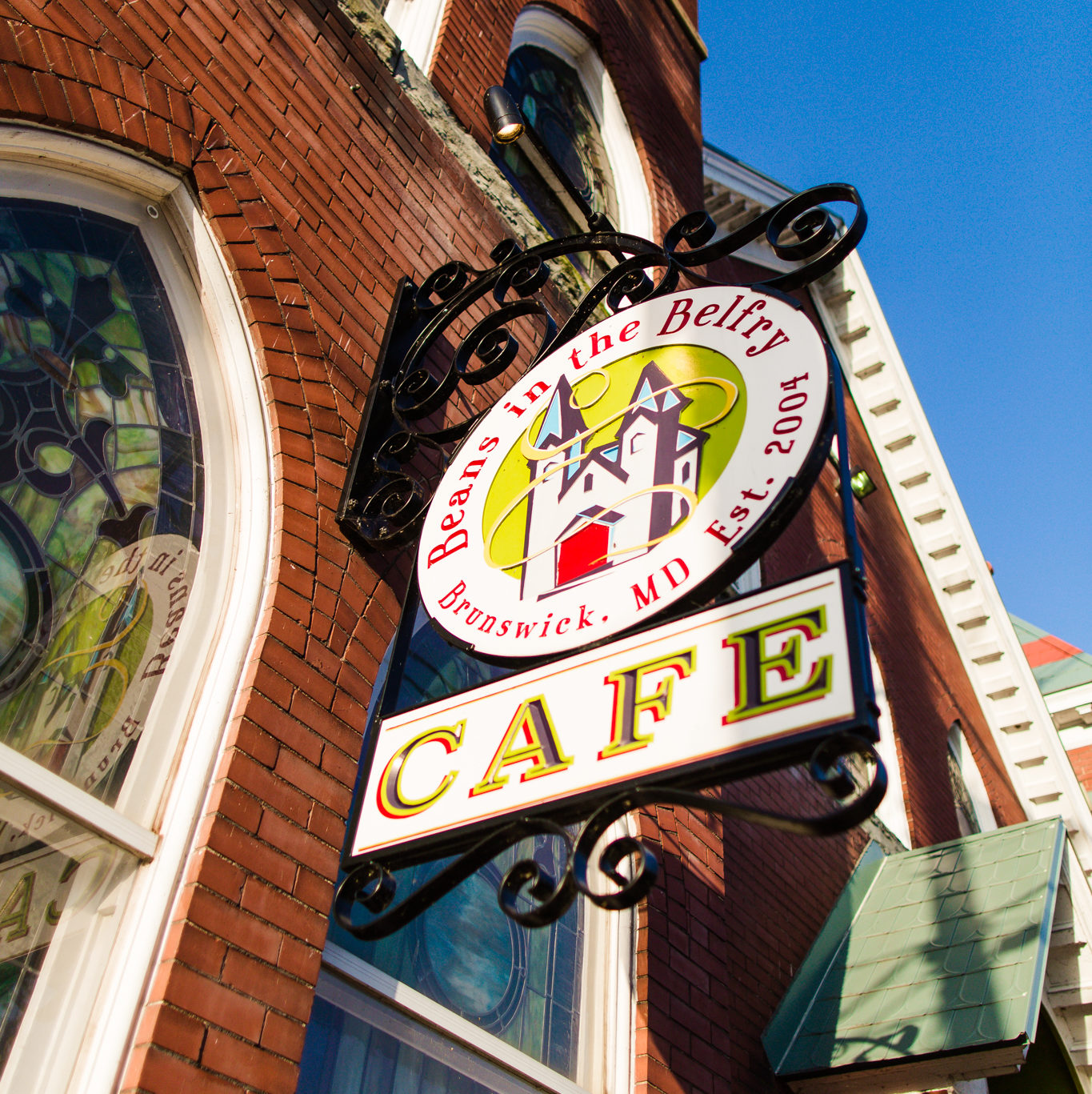 sign in front of the Beans in Belfry store.